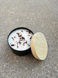 Hand-poured Bees and Botany candle with warm scent notes and soft neutral aesthetic